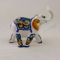 Elephant with trunk raised - Fiore Blu